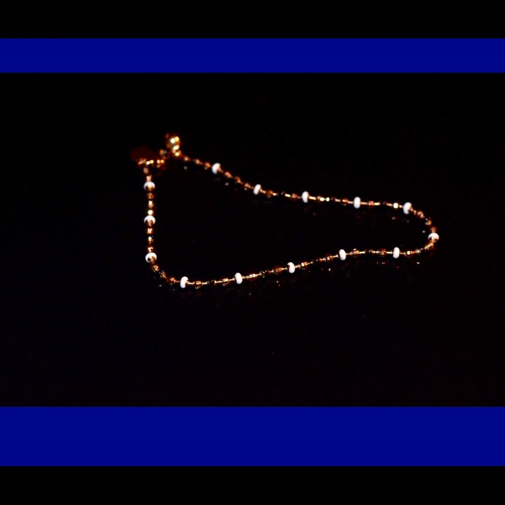 Black and gold anklet